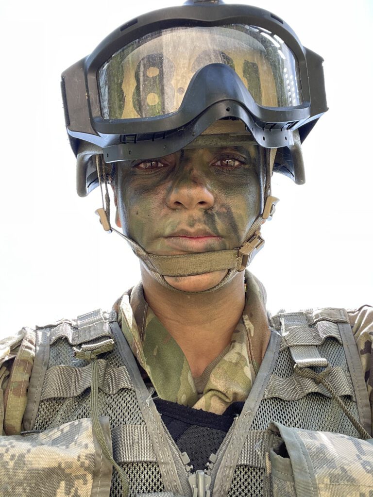 Rebeca Elizabeth during military service — discipline and resilience behind her business systems and leadership coaching